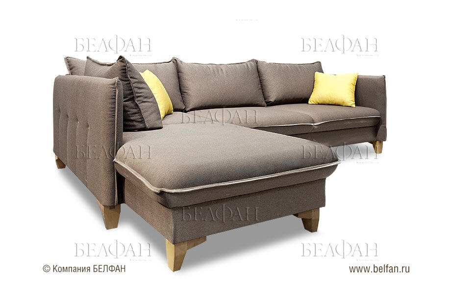 Как расположить диван с оттоманкой в интерьере